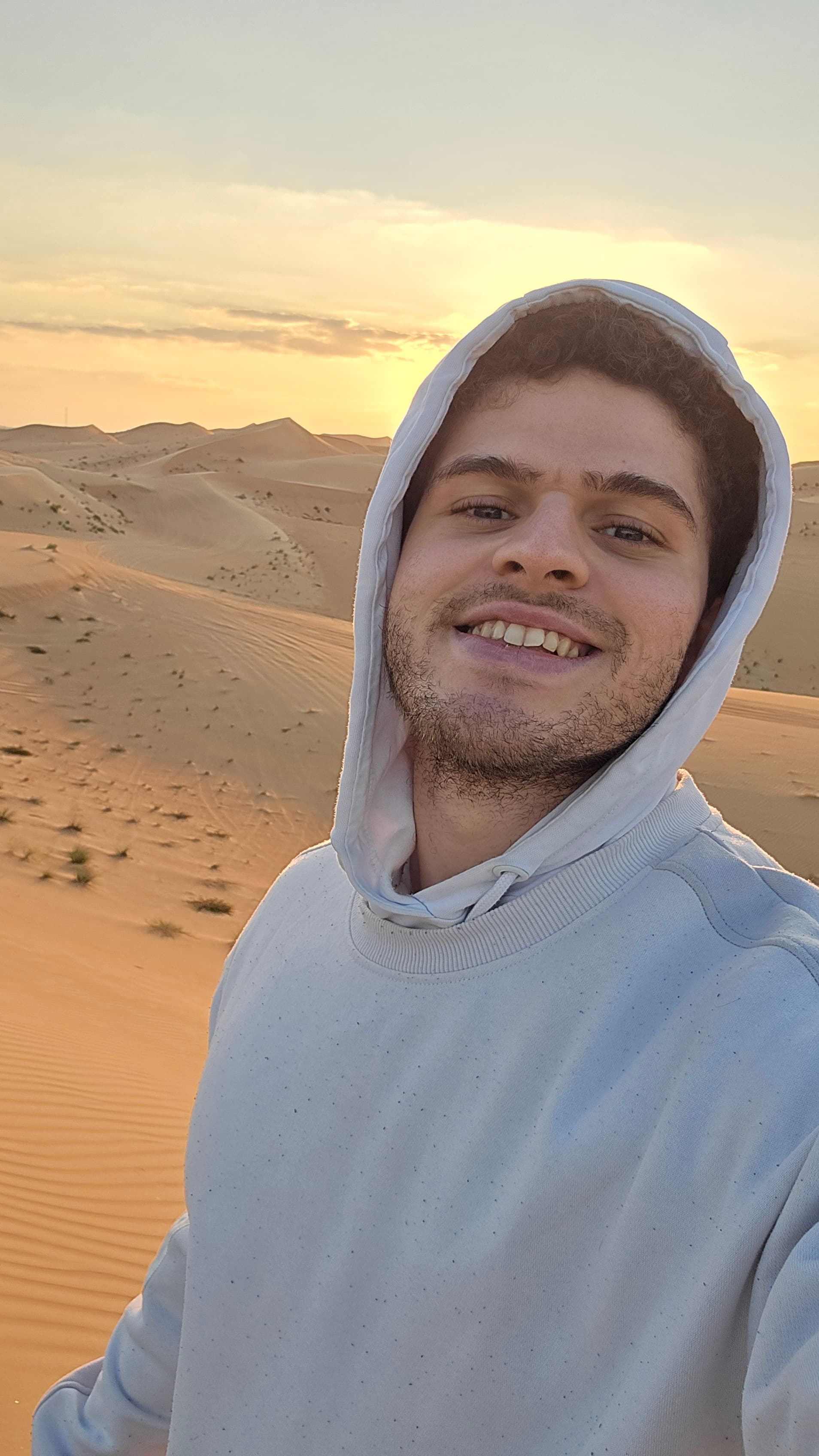 Mikael in the dunes outside Abu Dhabi at sunset